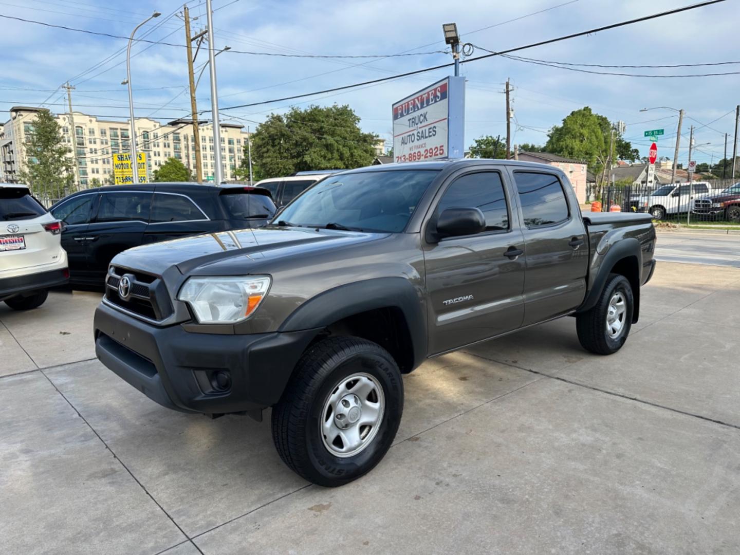 2012 Brown /Silver Toyota Tacoma SR5 (5TFJU4GN5CX) with an 4.0L engine, Automatic transmission, located at 1501 West 15th St., Houston, 77008, (713) 869-2925, 29.797941, -95.411789 - Photo#0